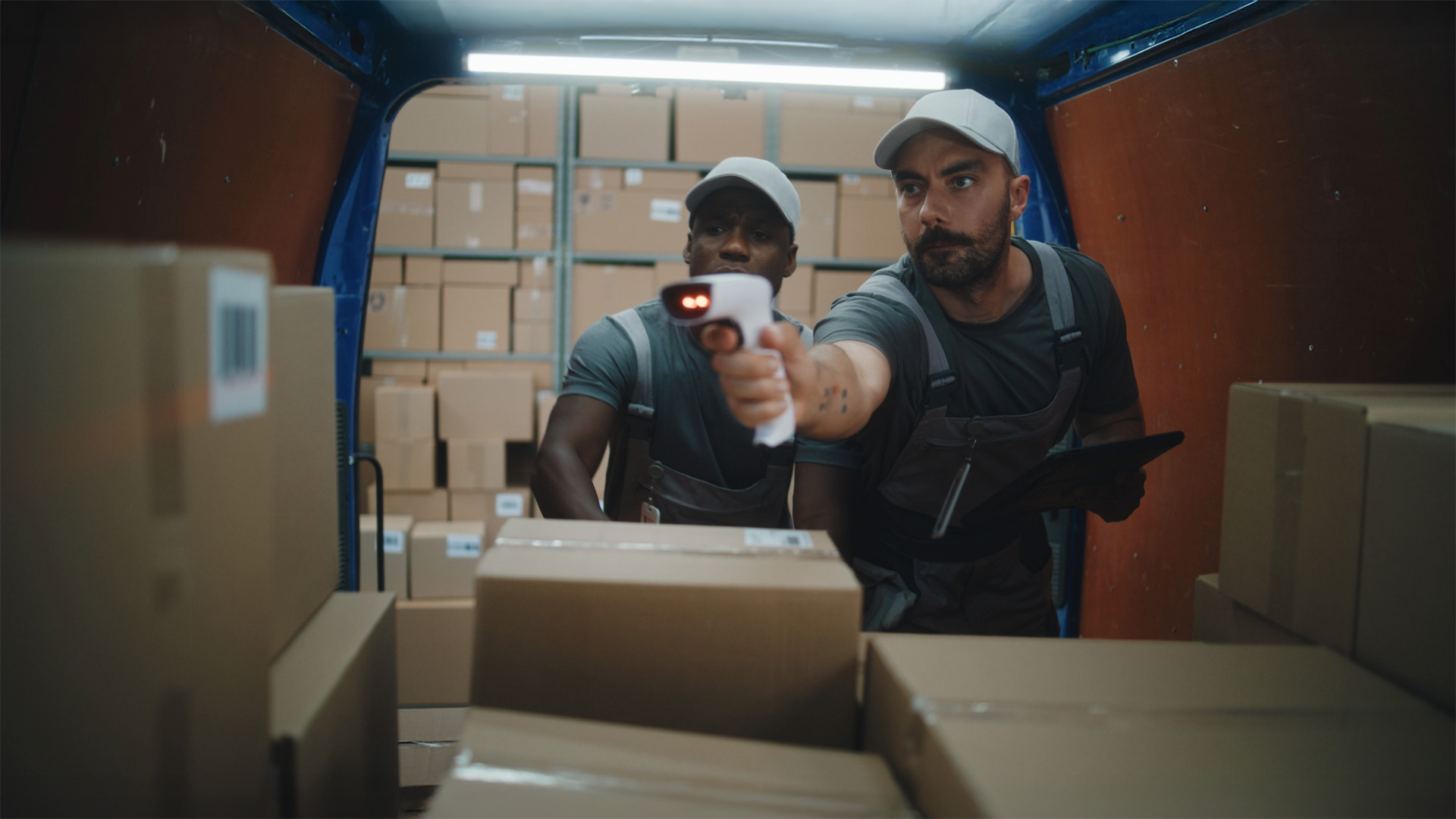 Transportation and logistics teams using Zebra handheld technology, supported by C5MI, for accurate shipment tracking.